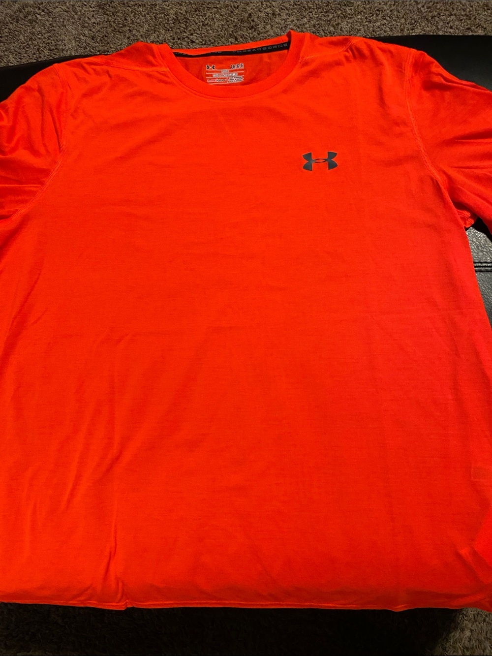 Under Armour Bright Orange Short Sleeve Heatgear Shirt.